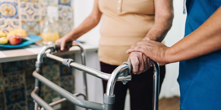 Carer supporting a loved one at home